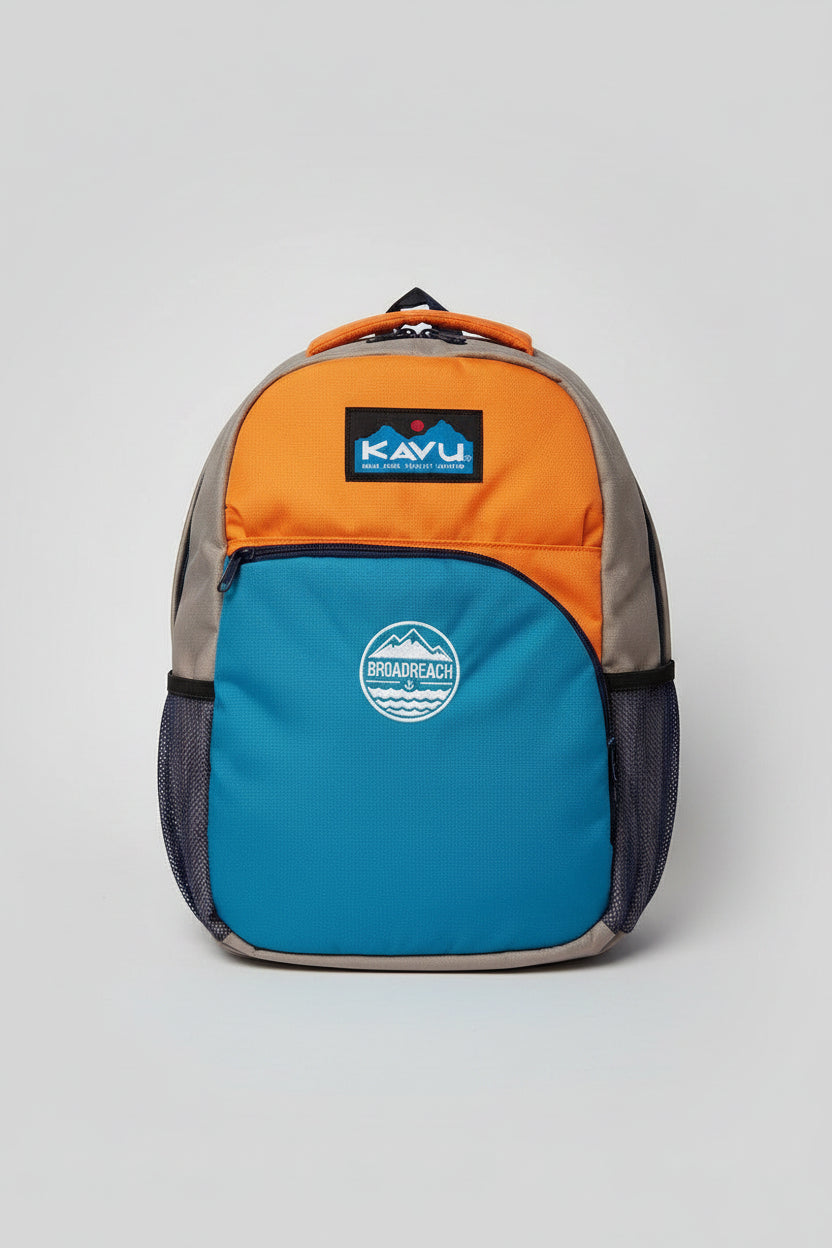Multicolored backpack with visible brand logo on a wooden surface