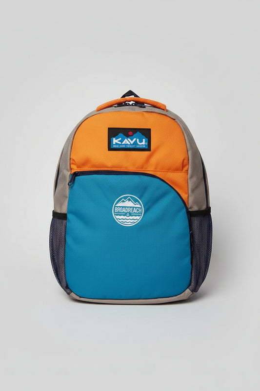 Multicolored backpack with visible brand logo on a wooden surface